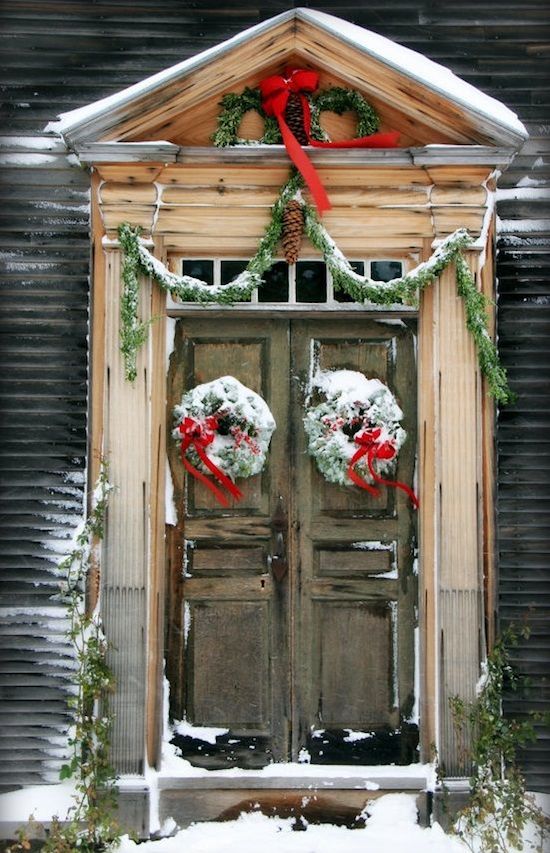 Wooden Front Doow With Snowy Wreath Christmas Decorating Ideas